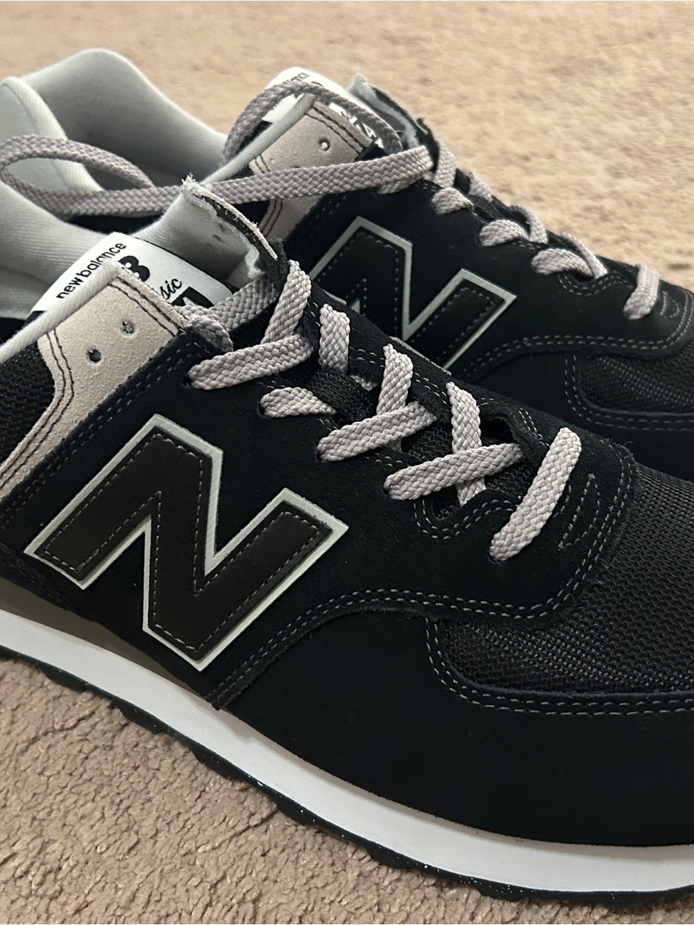 New Balance Men’s Black and White 574 Classic Sneakers